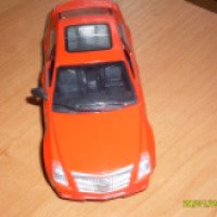 Коллекционная модель автомобиля Junsheng Toys Cadillac CTS 1/32