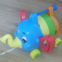 Развивающая музыкальная игрушка Tomy "Слоненок-оркестр"