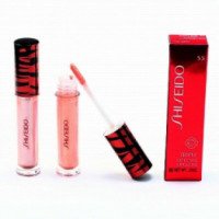 Блеск для губ Shiseido Triple effective lipgloss