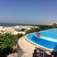Отель The Cove Rotana Resort Ras Al Khaimah 5* 