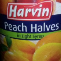 Консервированные персики Harvin