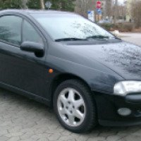 Автомобиль Opel Tigra A купе