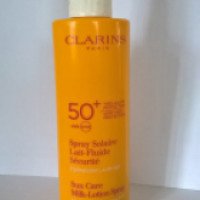 Солнцезащитное молочко-спрей Clarins Spray Solaire Lait-Fluide Securite SPF 50+