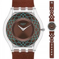 Наручные часы женские Swatch Classic Animal Skin SFK375