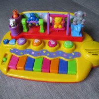 Развивающая игрушка Kiddieland "Пианино с животными на качелях"