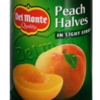 Консервированные половинки персиков Del Monte