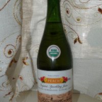 Газированный напиток с соком персика Val de France